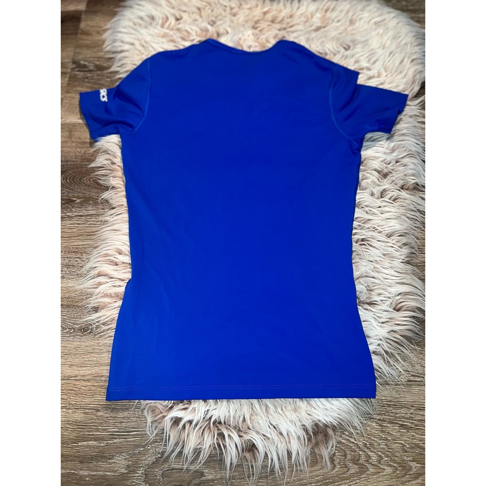 ASICS women’s blue top